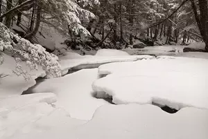 Frozen in Time: The Beauty of Diana's Baths. Photographic Journey into the heart of New Hampshire's White Mountains. Cascading waters meet granite bedrock.