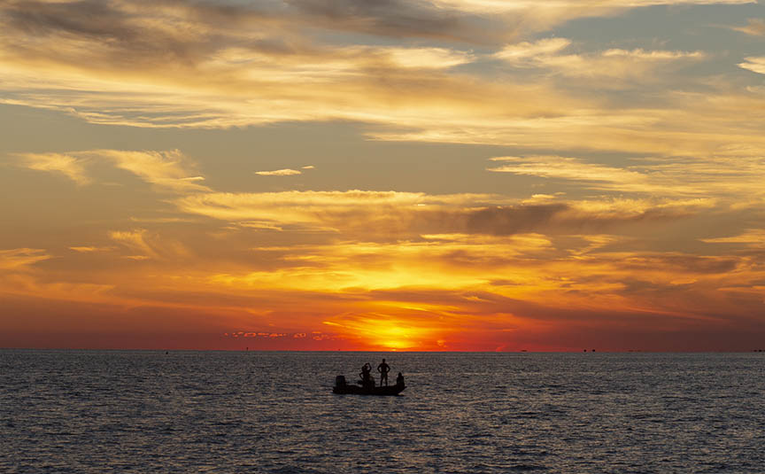 Sunset boat silhouette