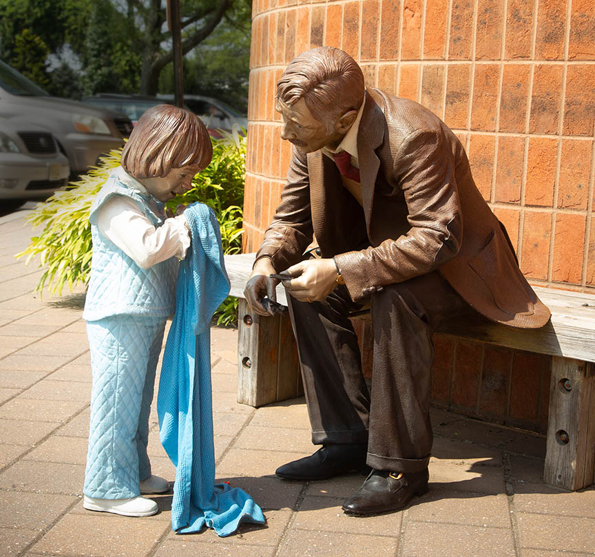 Man and child sculpture