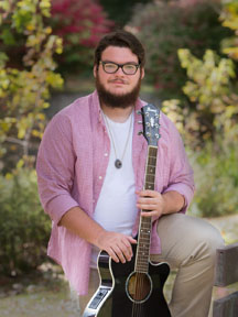 Graduation portrait outside at Glen Lake in Pitman