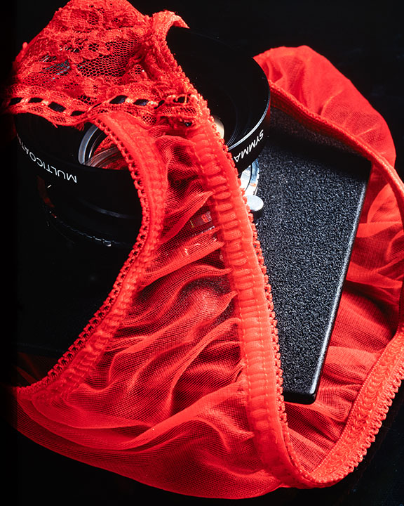 Camera lens and lace panties