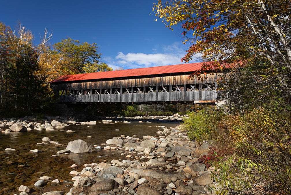 The covered bridge at Albany, NH as seen from the Passaconaway Road Side of the Swift River Albany Bridge From the Passaconaway Road Side