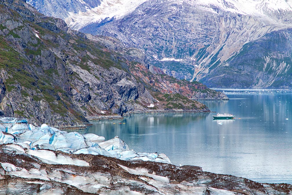 Lamplugh Glacier and small cruise ship