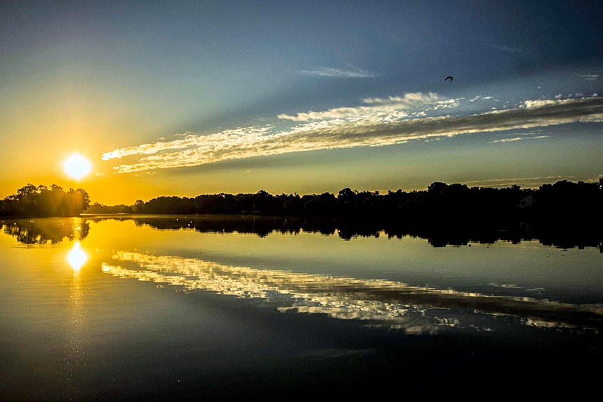 Mirror reflection of clouds at Cooper River Park